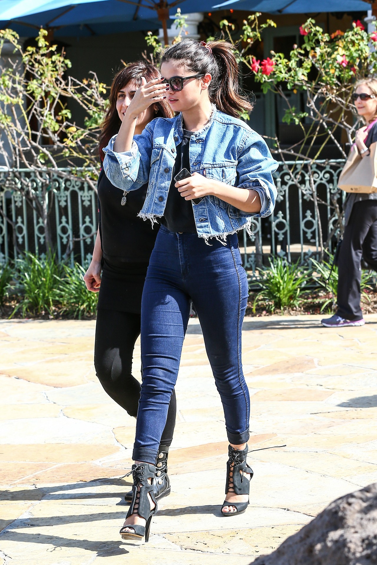 Selena Gomez is sexy in high-waisted denim at The Commons