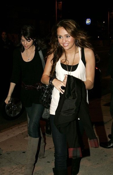 Selena Gomez and Miley Cyrus are walking